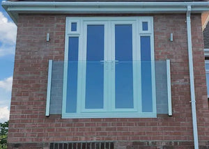 frameless glass Juliet balcony